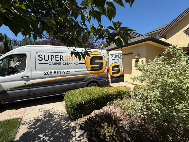 SuperShine Carpet Cleaning truck-mounted steam cleaning at a home in Eagle Idaho using professional equipment and green cleaning products